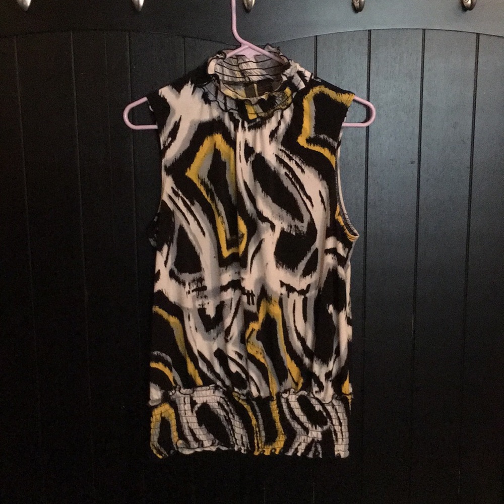 High neck dressy sleeveless blouse.